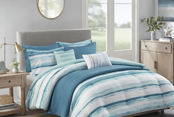 Marina 8 Piece Printed Seersucker Comforter and Quilt Set Collection in Aqua From Madison Park