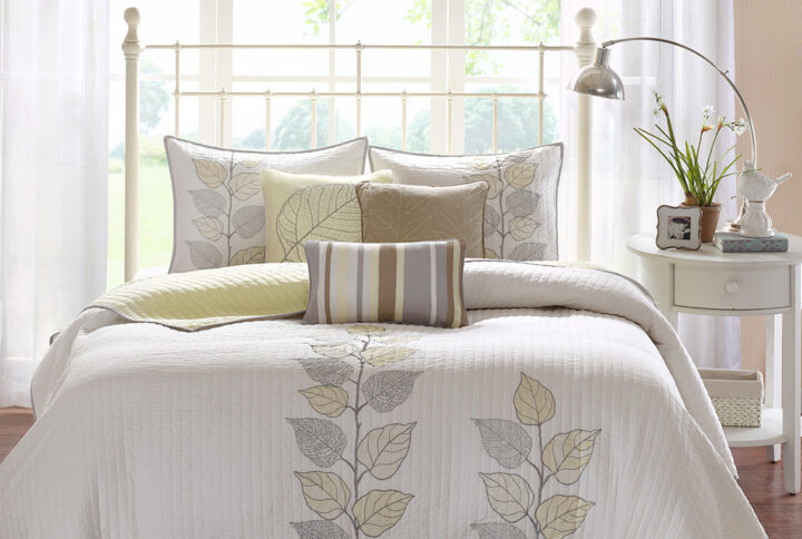 Caelie 6 Piece Embroidered Quilt Set with Throw Pillows in Yellow From Madison Park