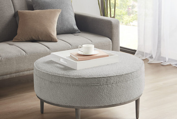 Harriet Upholstered Round Cocktail Ottoman with Metal Base 34" Dia in Grey From Madison Park