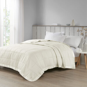 Cambria Oversized Down Alternative Blanket with Satin Trim in Ivory From Madison Park