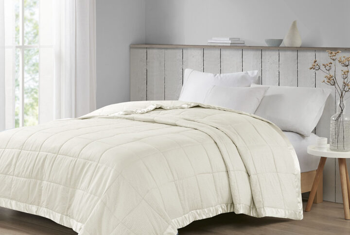 Cambria Oversized Down Alternative Blanket with Satin Trim in Ivory From Madison Park