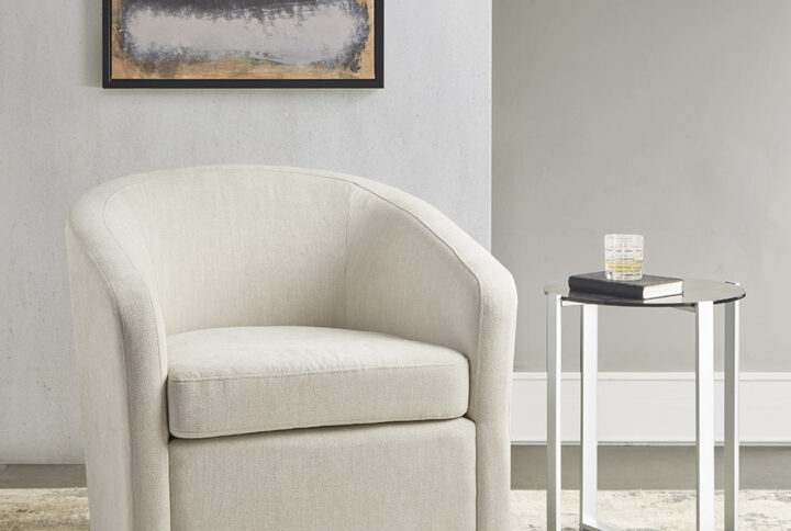 Amber Swivel Chair in Ivory From Martha Stewart