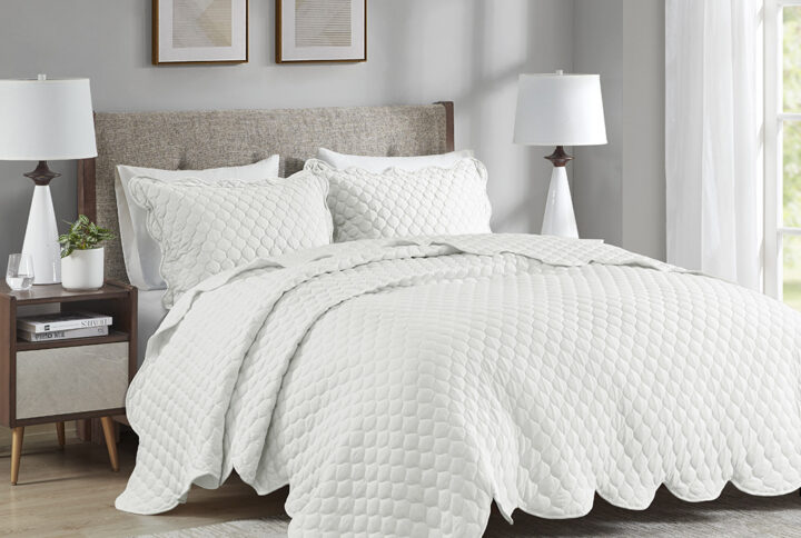 Nala 3 Piece Scalloped Edge Crinkle Microfiber Quilt Set in Ivory From Madison Park