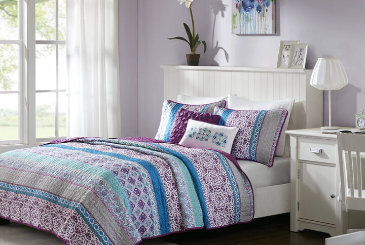 Joni Reversible Quilt Set with Throw Pillows in Purple From Intelligent Design